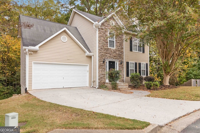 view of front of property featuring a garage