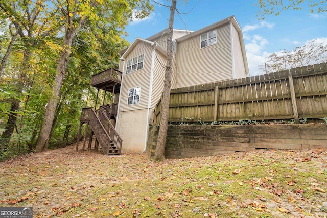 rear view of house with a deck