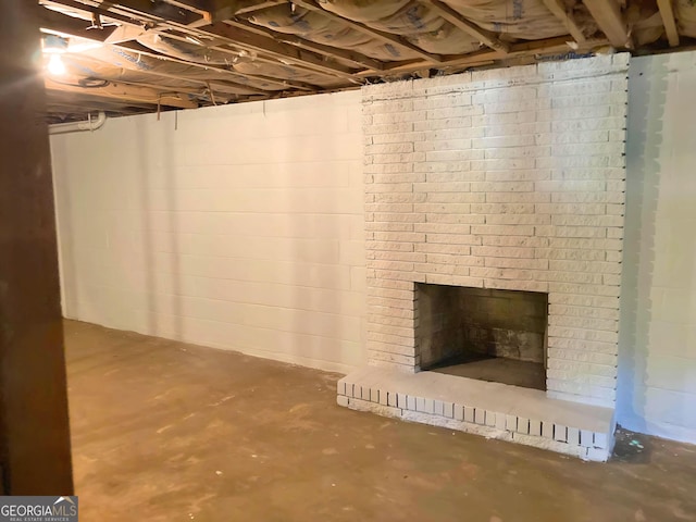 basement with a fireplace