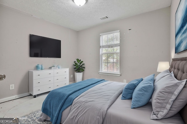 bedroom with a textured ceiling