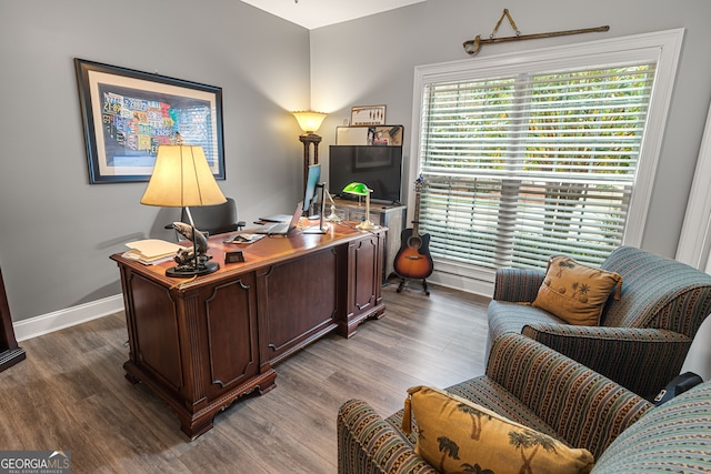 office area with wood-type flooring