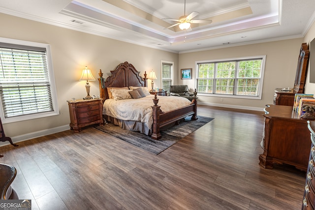 bedroom featuring multiple windows, crown molding, ceiling fan, and dark hardwood / wood-style floors