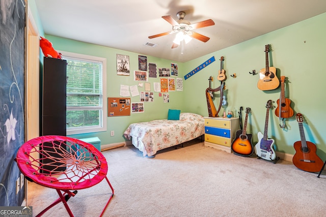 carpeted bedroom featuring ceiling fan