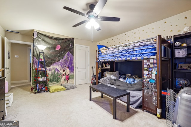 bedroom with carpet flooring and ceiling fan