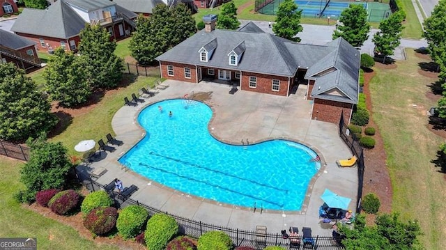 view of pool featuring a patio area