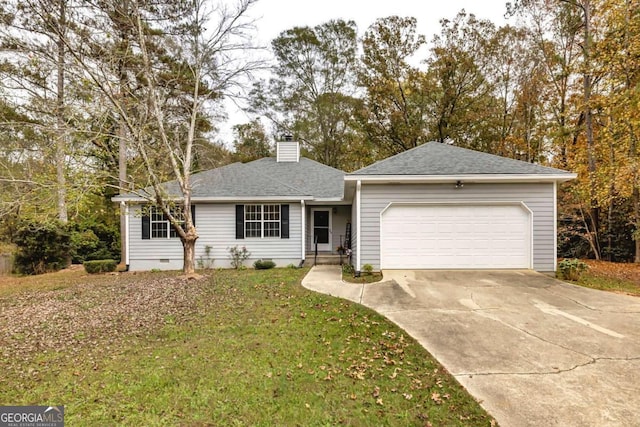 ranch-style house featuring a front yard and a garage