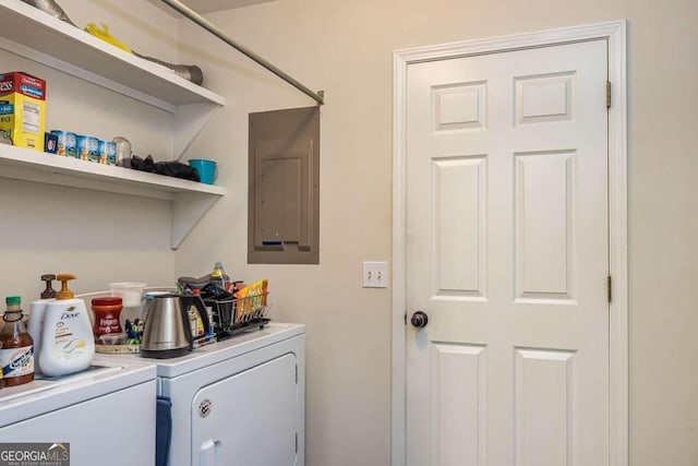 laundry area featuring electric panel and independent washer and dryer