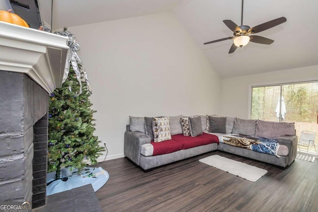 living room featuring a brick fireplace, dark hardwood / wood-style flooring, high vaulted ceiling, and ceiling fan