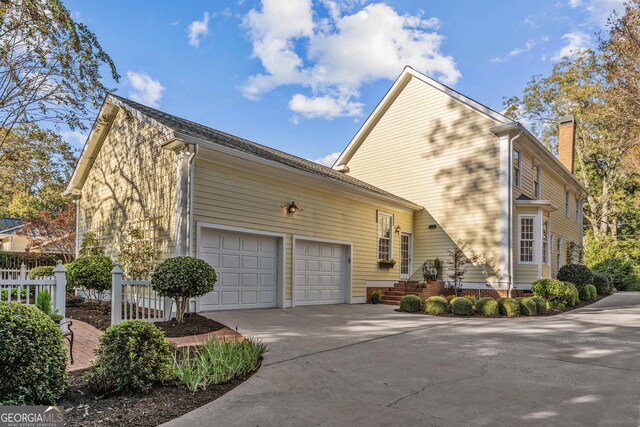 view of yard with a garage