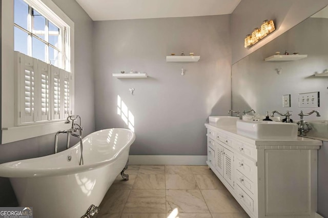 bathroom with a bathing tub and vanity