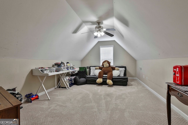 playroom with lofted ceiling, light carpet, and ceiling fan