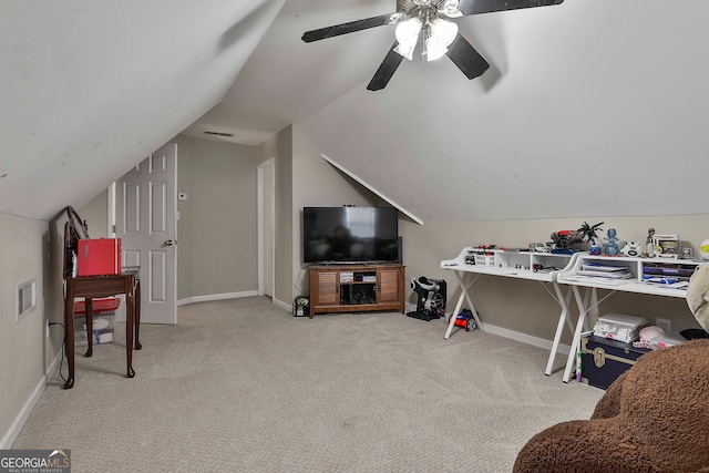 additional living space with lofted ceiling, light carpet, and ceiling fan