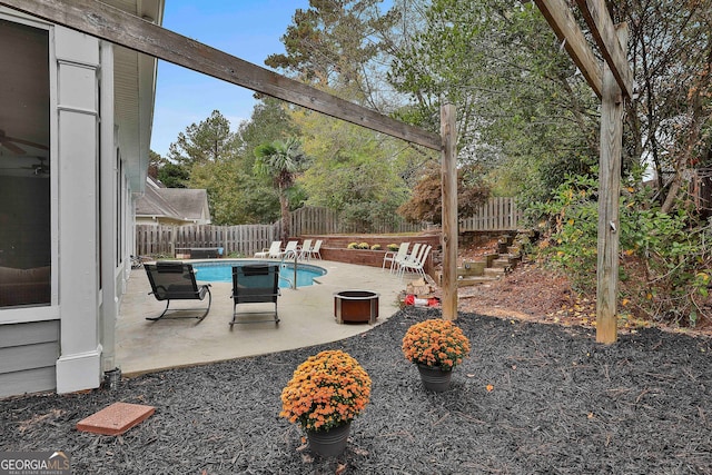 exterior space featuring a fenced in pool