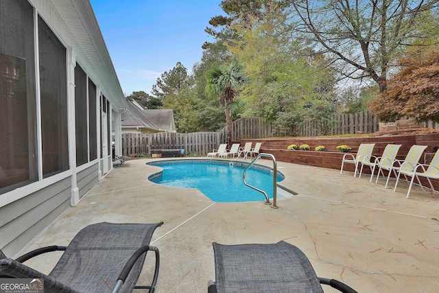 view of pool with a patio area