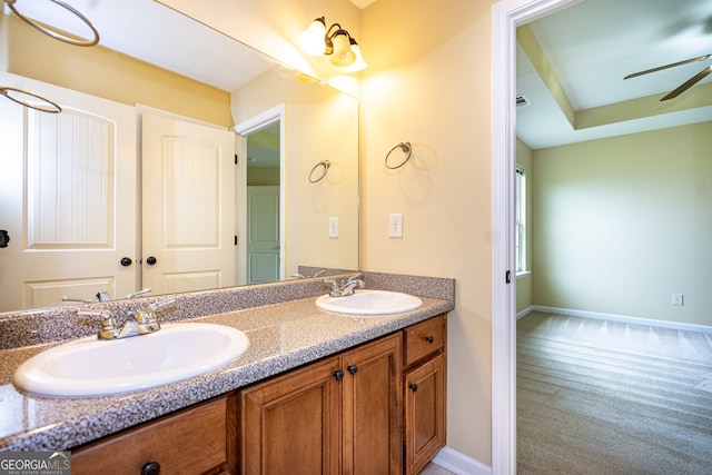 bathroom with vanity and ceiling fan