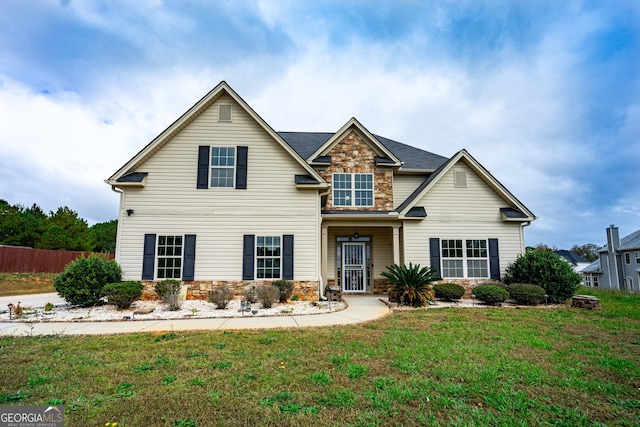 view of front of house featuring a front lawn