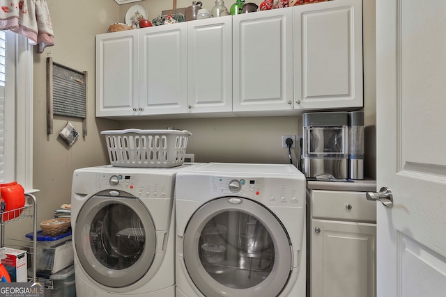 laundry area featuring cabinets and independent washer and dryer