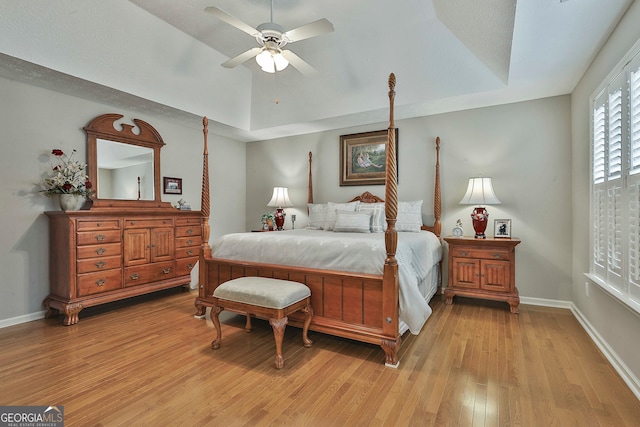 bedroom featuring ceiling fan and light wood-type flooring