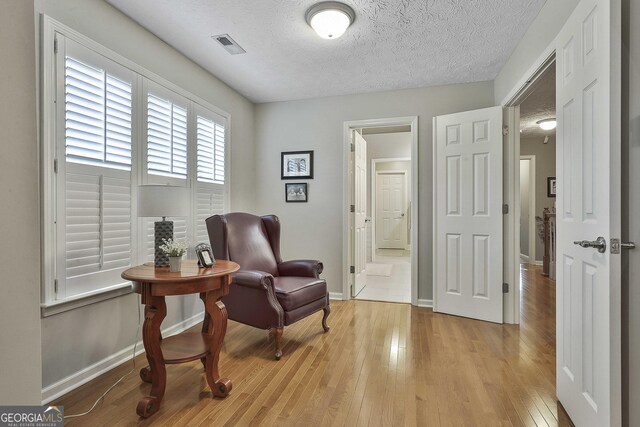 bathroom featuring vanity, tile patterned floors, and crown molding