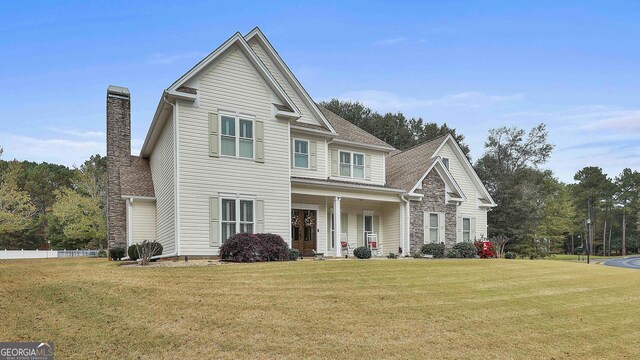 view of front of property featuring a front lawn