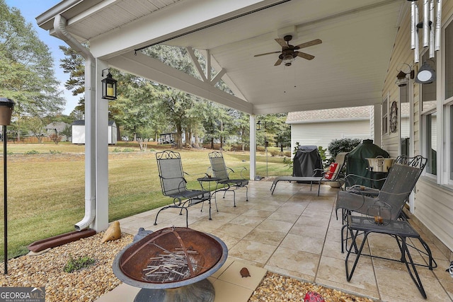 view of patio featuring ceiling fan