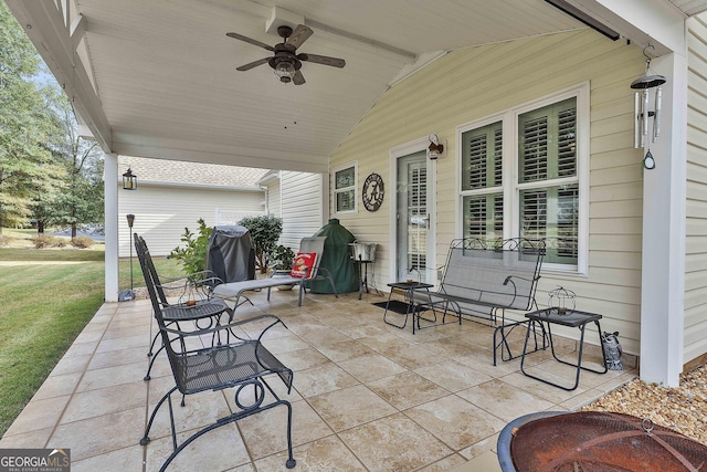 view of patio with a ceiling fan