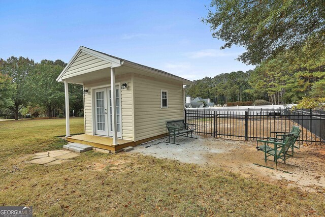 back of house with a yard