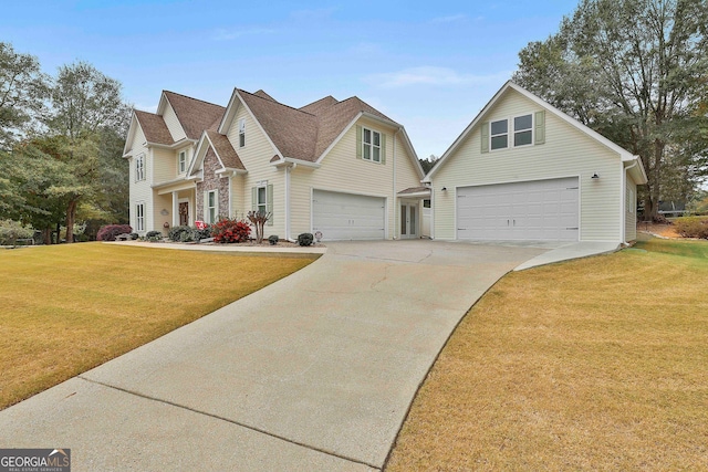 view of front of home featuring a garage and a front yard