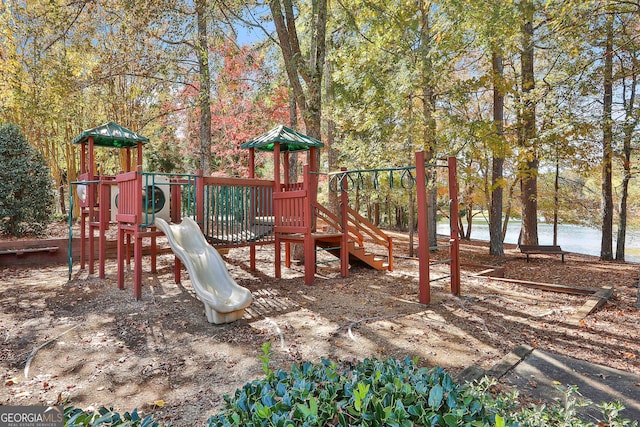 view of playground featuring a water view