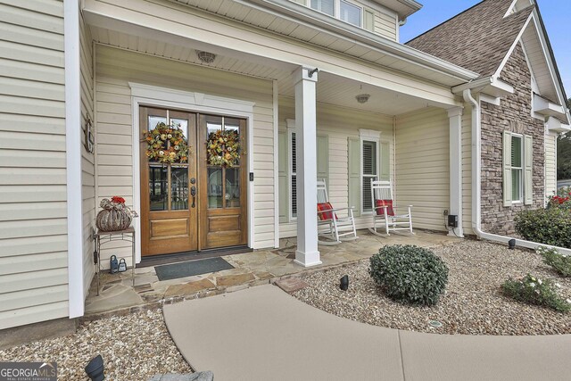 entrance to property featuring a porch