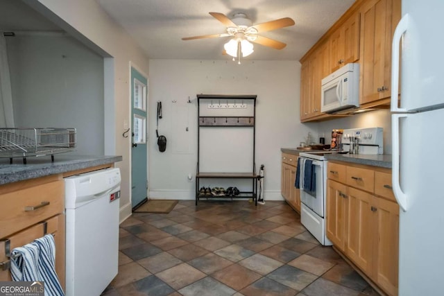 kitchen with white appliances and ceiling fan