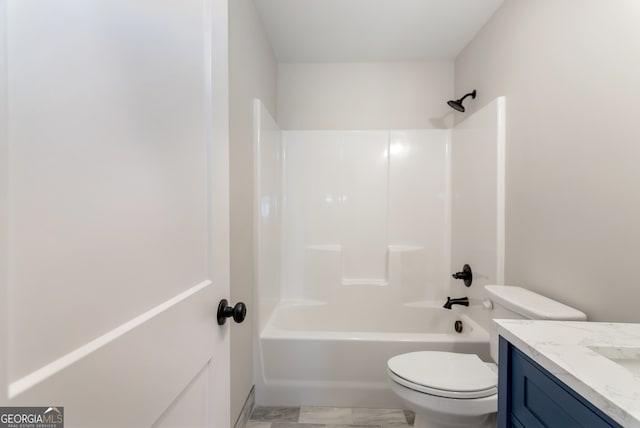 full bathroom featuring vanity, toilet, and bathtub / shower combination