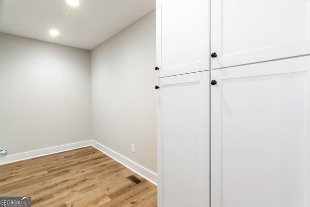 corridor featuring light hardwood / wood-style flooring