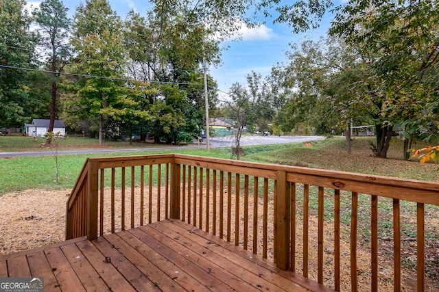 deck featuring a lawn