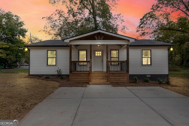 bungalow-style home with covered porch