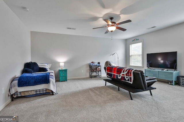 carpeted bedroom featuring ceiling fan