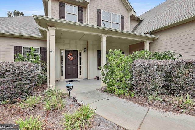 entrance to property with covered porch