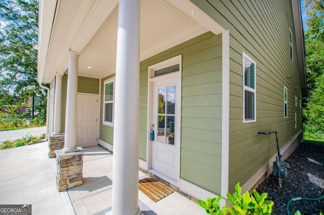 entrance to property with a porch