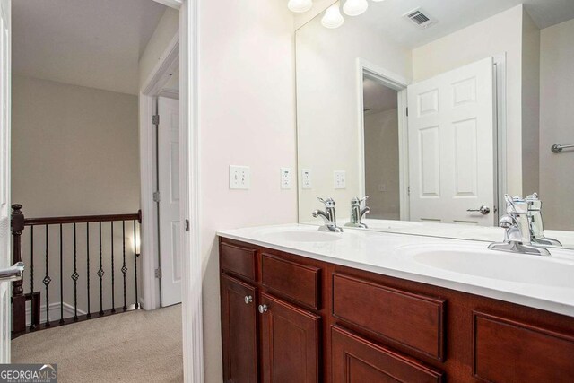 bedroom with ceiling fan and light colored carpet