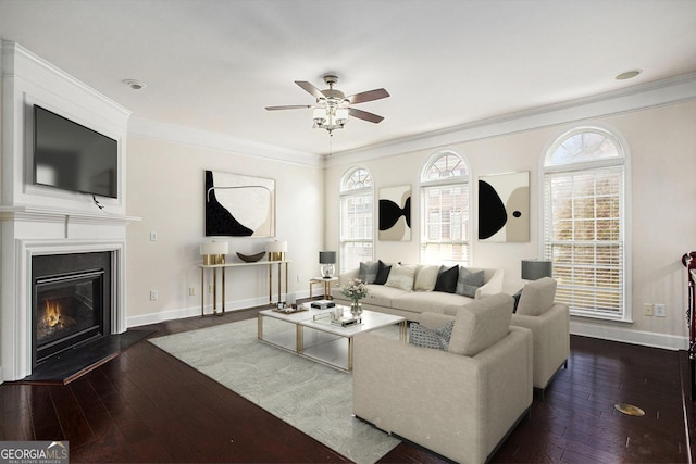 living room featuring crown molding, dark hardwood / wood-style flooring, and ceiling fan