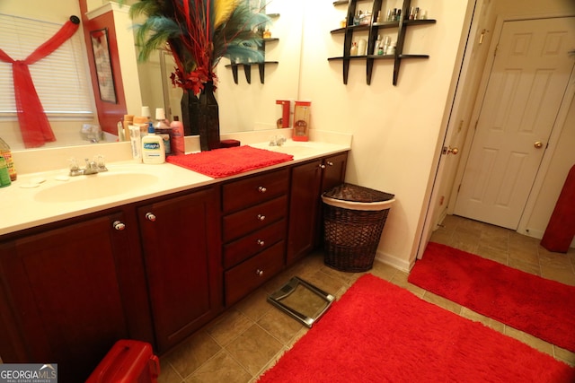 bathroom with tile patterned flooring and vanity