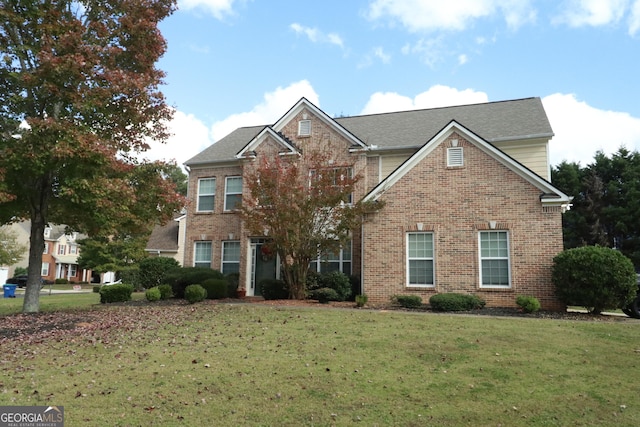 front of property with a front lawn