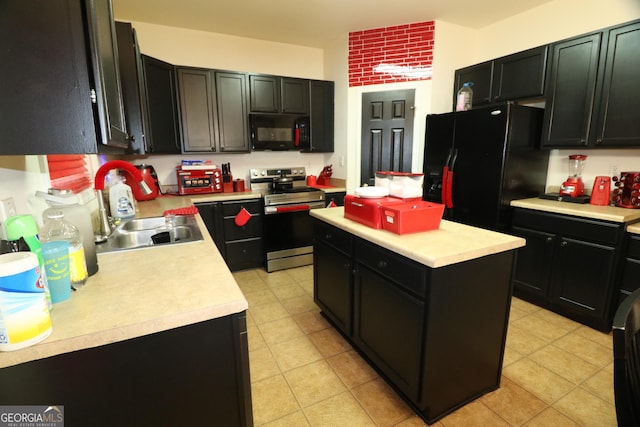 kitchen featuring sink, a kitchen island, and black appliances