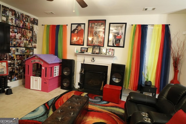 interior space featuring carpet flooring and ceiling fan