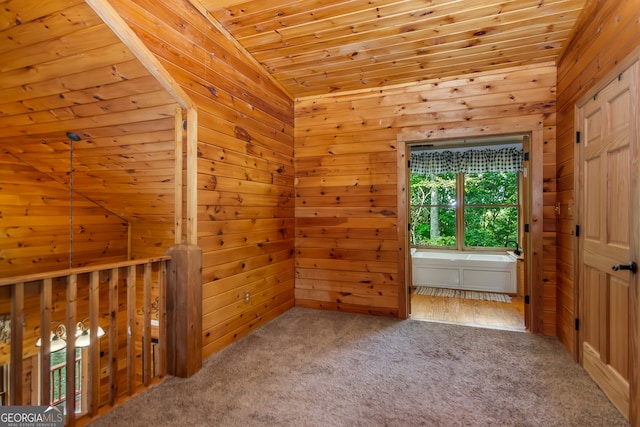 additional living space featuring wooden ceiling, lofted ceiling, wood walls, and carpet floors