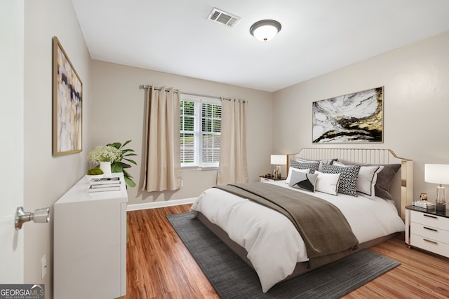 bedroom featuring light hardwood / wood-style floors