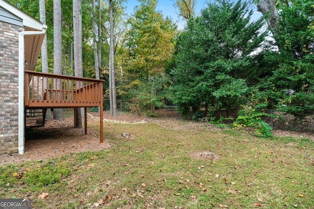 view of yard with a deck