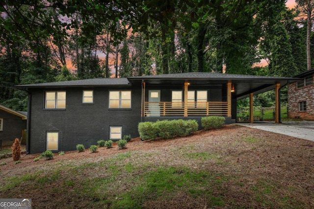 view of front of property with a carport