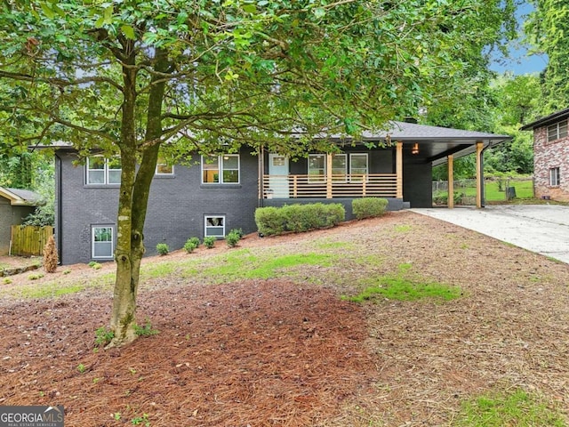 view of front facade with a carport