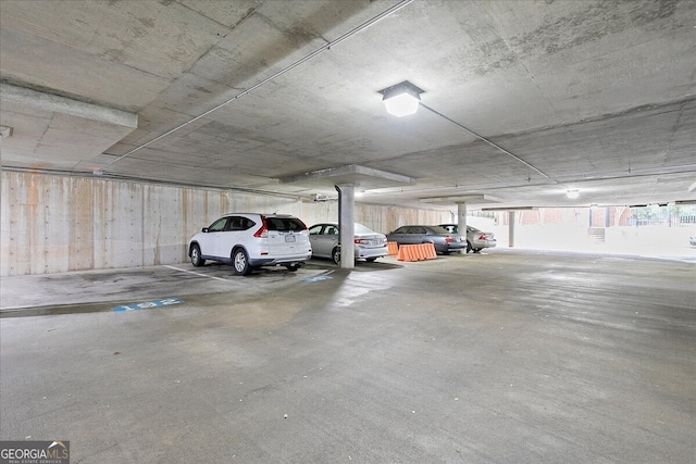 garage featuring a carport